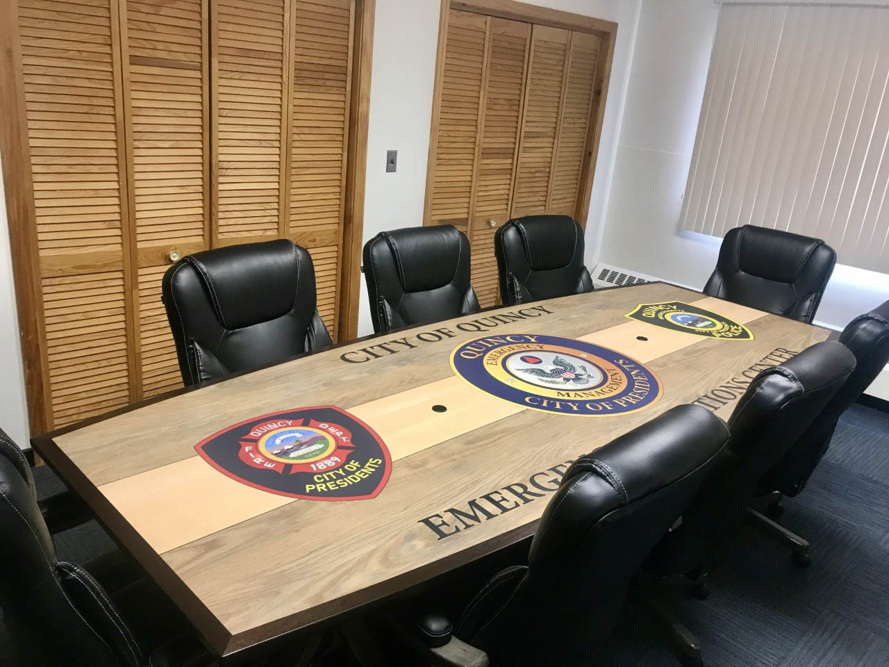 EOC Table2 City of Quincy Modern Table with Logos