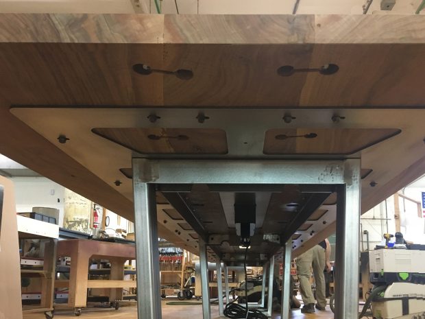 solid wood conference table with steel base