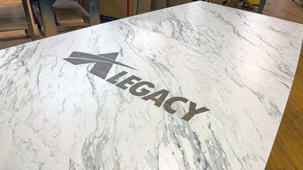 Branded conference room table with integrated company logo design